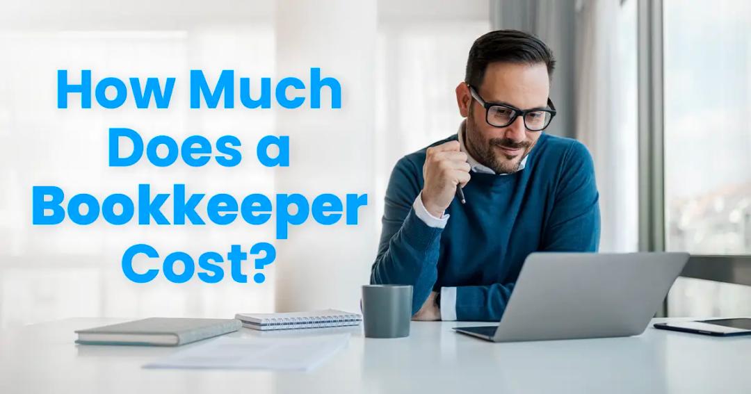 A man wearing glasses and a blue sweater is sitting at a desk, looking at a laptop. The text on the image reads "How Much Does a Bookkeeper Cost?.